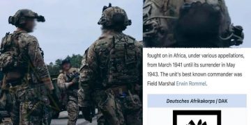 Soldado yanqui con un símbolo nazi en la mochila (¿alguna sorpresa? pasen y vean)